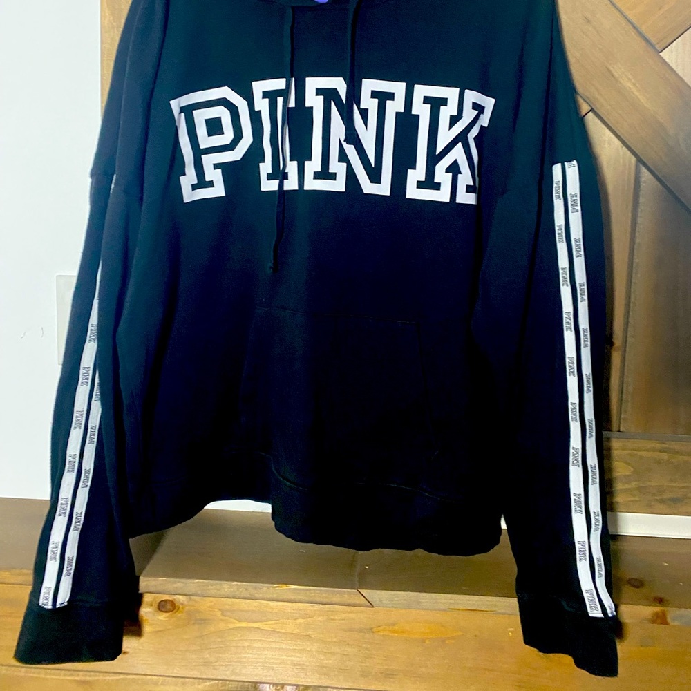 Black Pink brand sweatshirt.